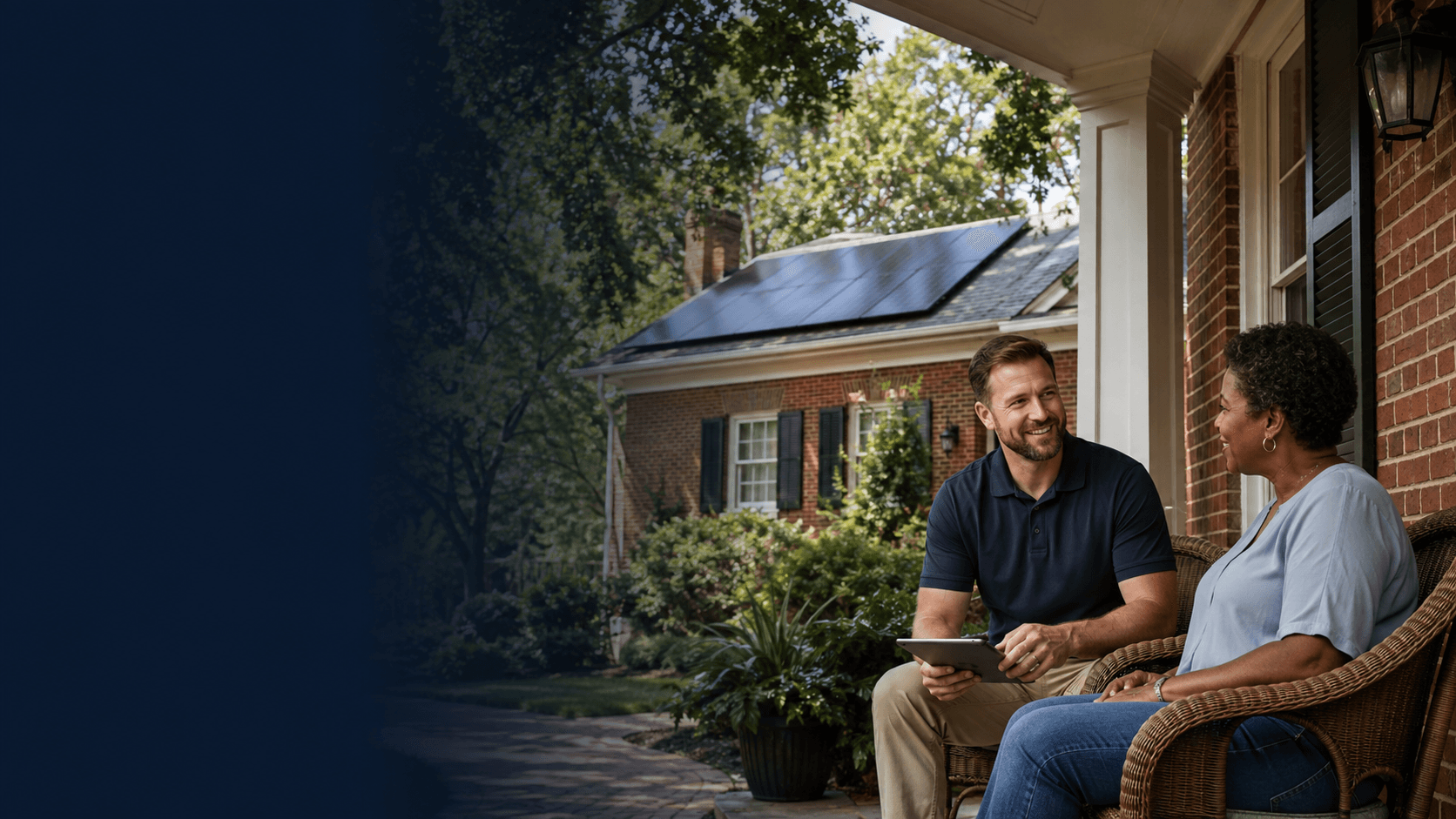 A friendly solar consultation on a back porch at dusk